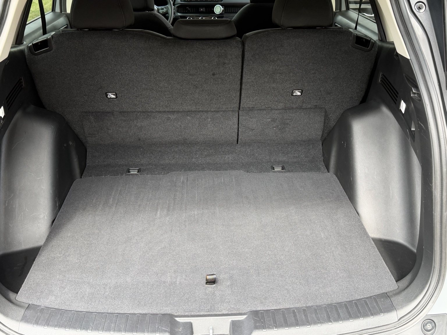 Clean vehicle cargo area after detailing